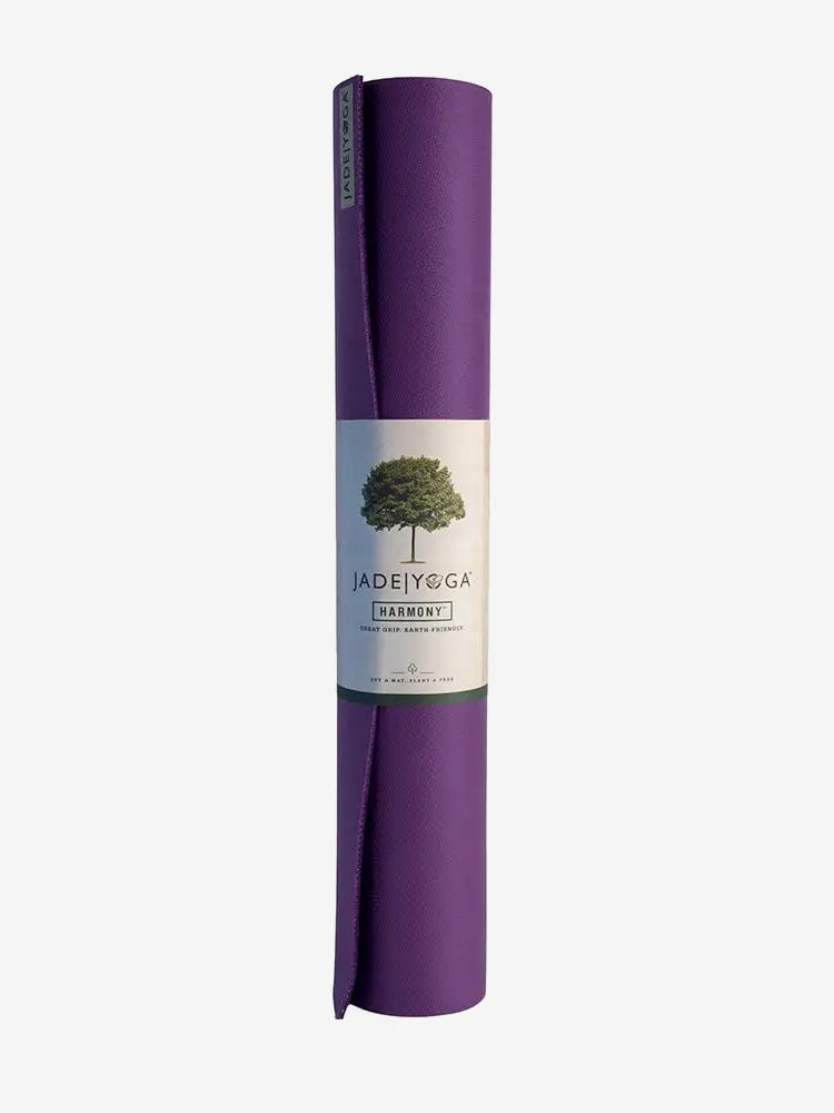 JadeYoga Harmony purple yoga mat rolled up shot from the side with label visible, eco-friendly fitness equipment, non-slip exercise mat.